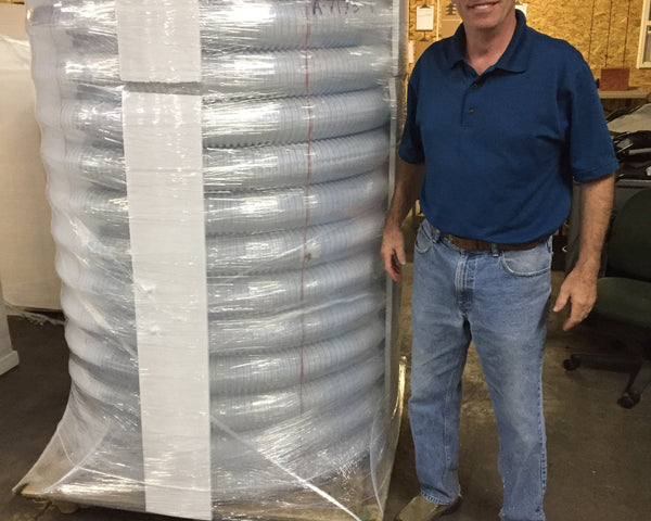 Warren Walborn with rolled insulated pex pipe